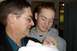 Keira just born with Grandpa and Daddy